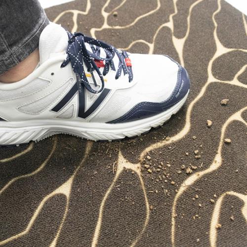 Alfombra de puerta con estampado de terciopelo pisando fuerte