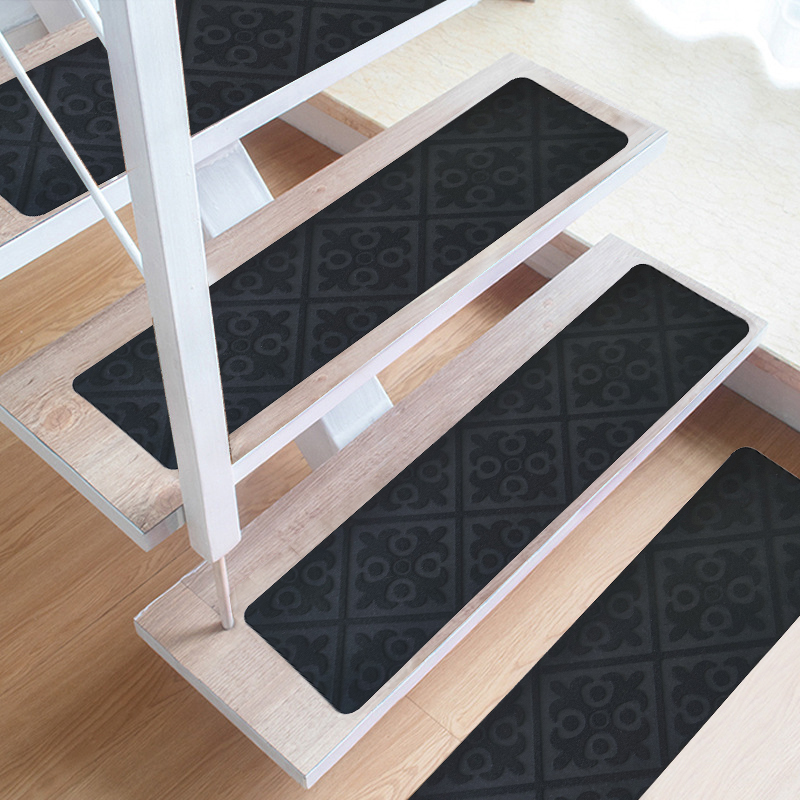 La estera grabada en relieve de la escalera del modelo es aplicable al piso adhesivo de la oficina del hotel familiar
